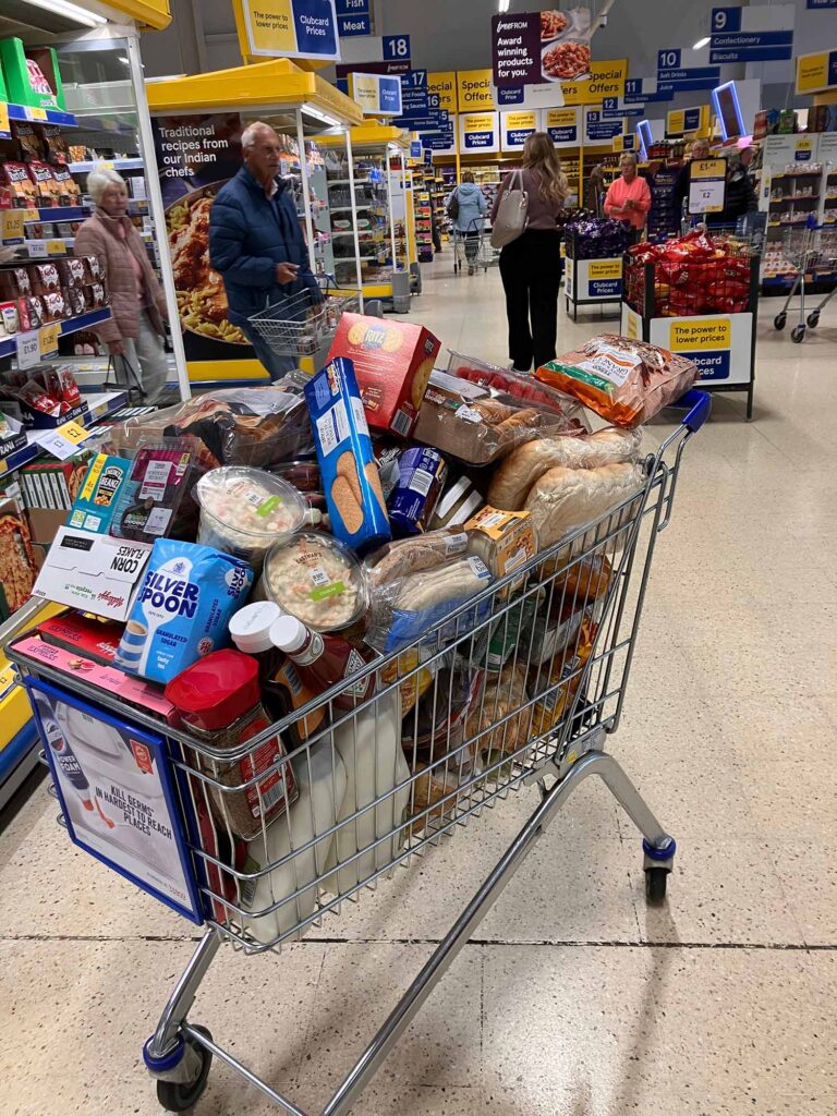 A picture of a shopping trolley full of shopping for the Engine Room's trip to the Peak Distict